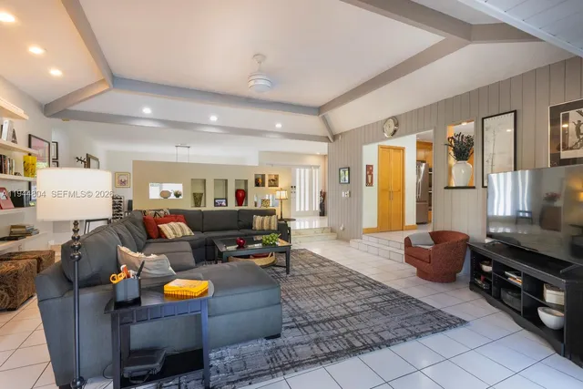 a view of swimming pool with outdoor seating