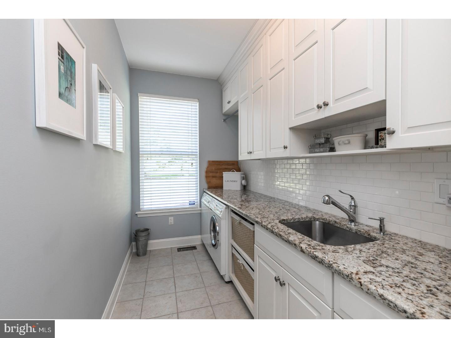 80 Paddock Circle Spring City, PA 19475 - Photo 13 of 25 a kitchen that has a sink and a stove