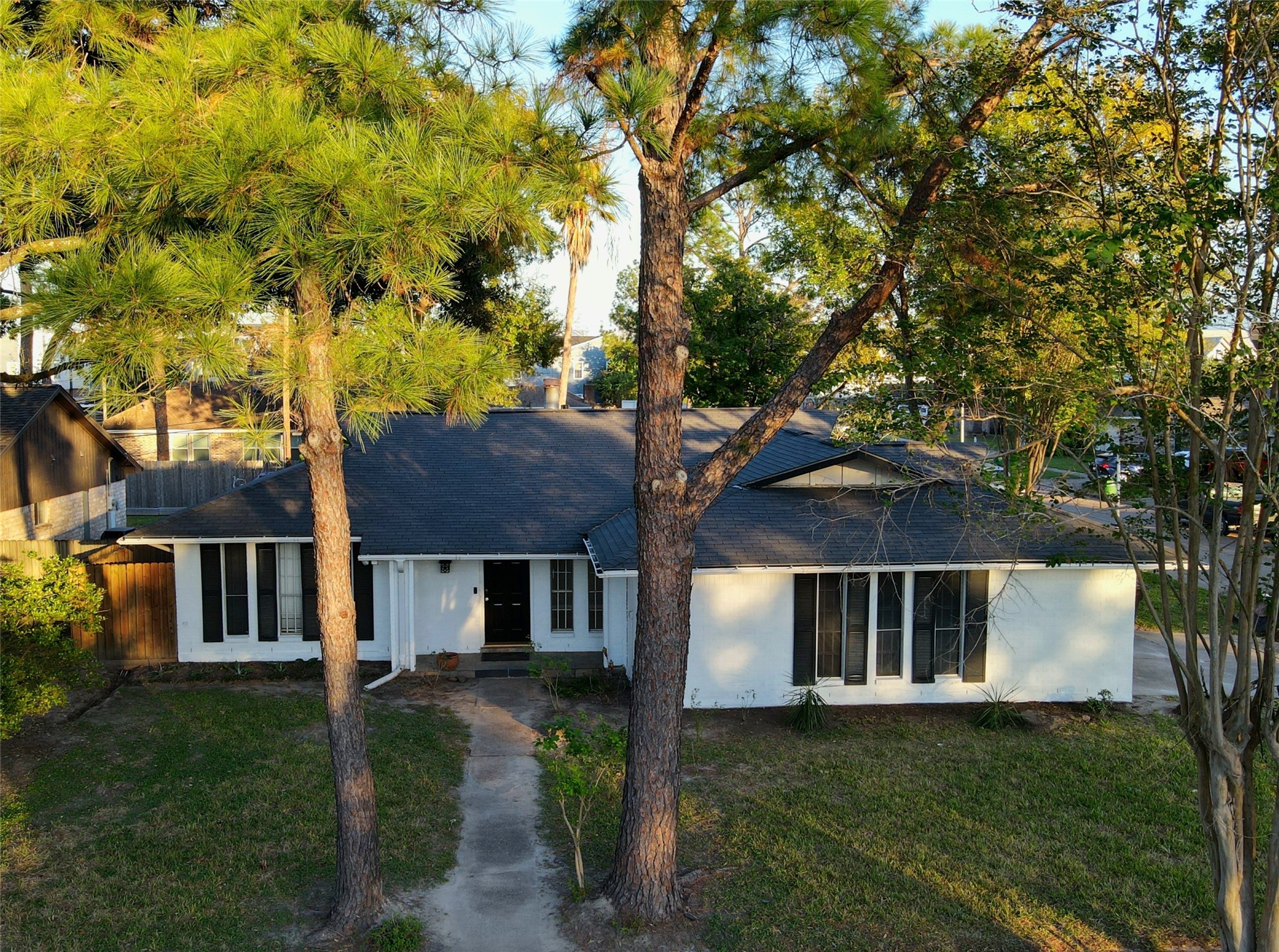 2502 Knoll Street Houston, TX 77080 - Photo 2 of 38 a front view of a house with a garden