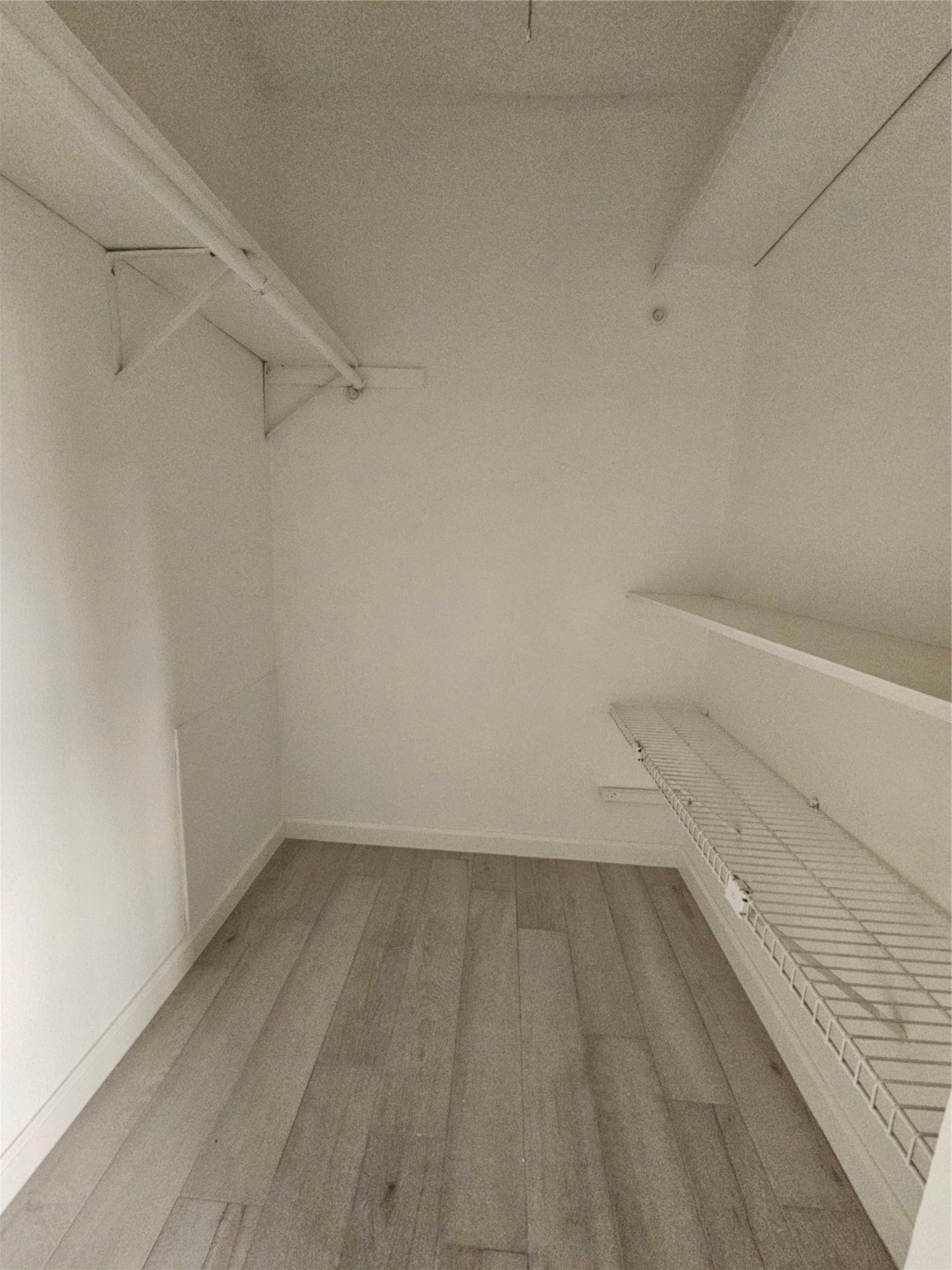 2502 Knoll Street Houston, TX 77080 - Photo 23 of 38 a view of a room with racks on the wall