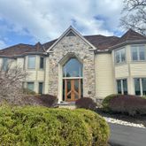 a view of a house with a garden