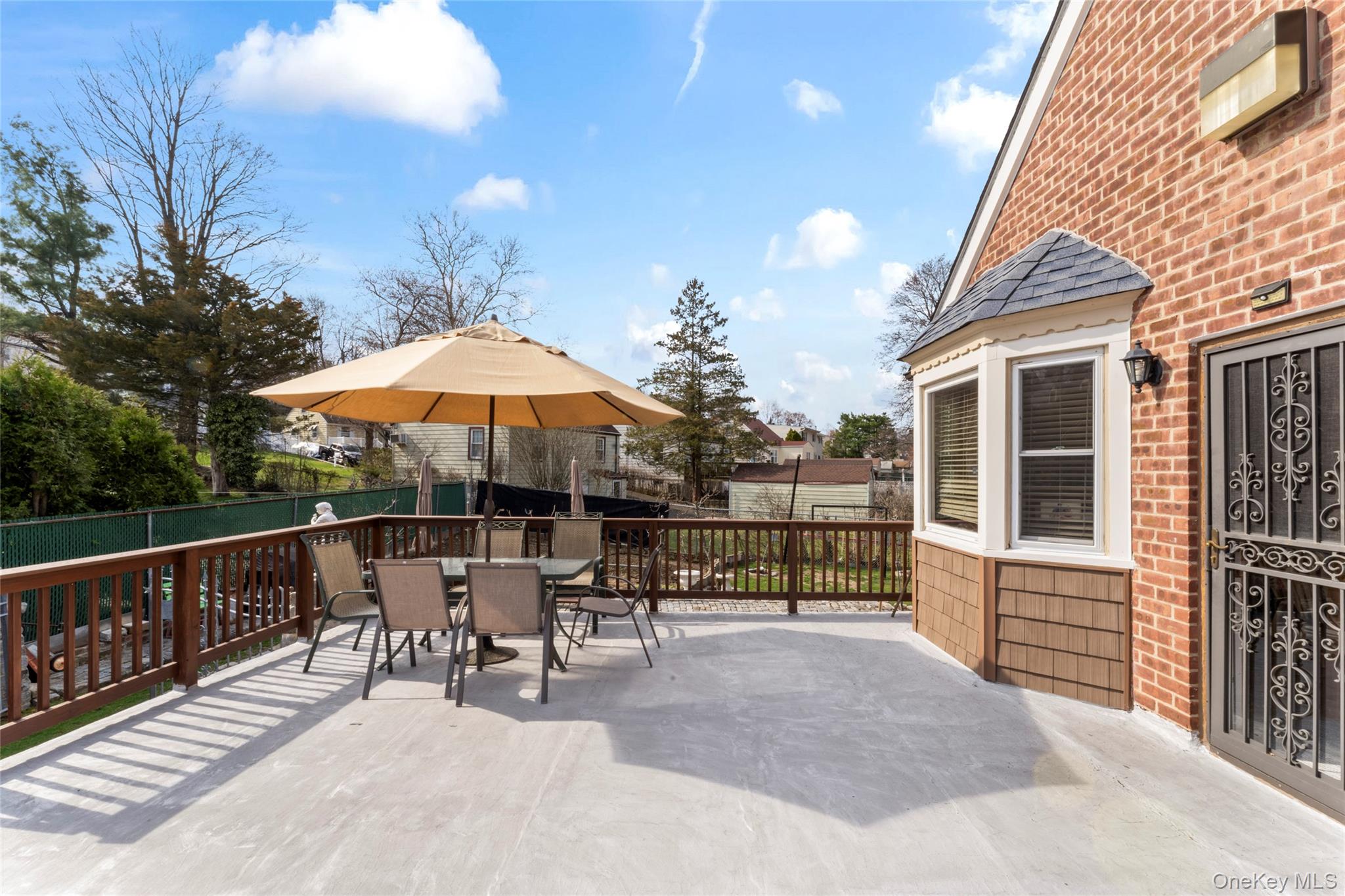 18 Butler Place Yonkers, NY 10710 - Photo 29 of 46 a patio with a patio table and chairs