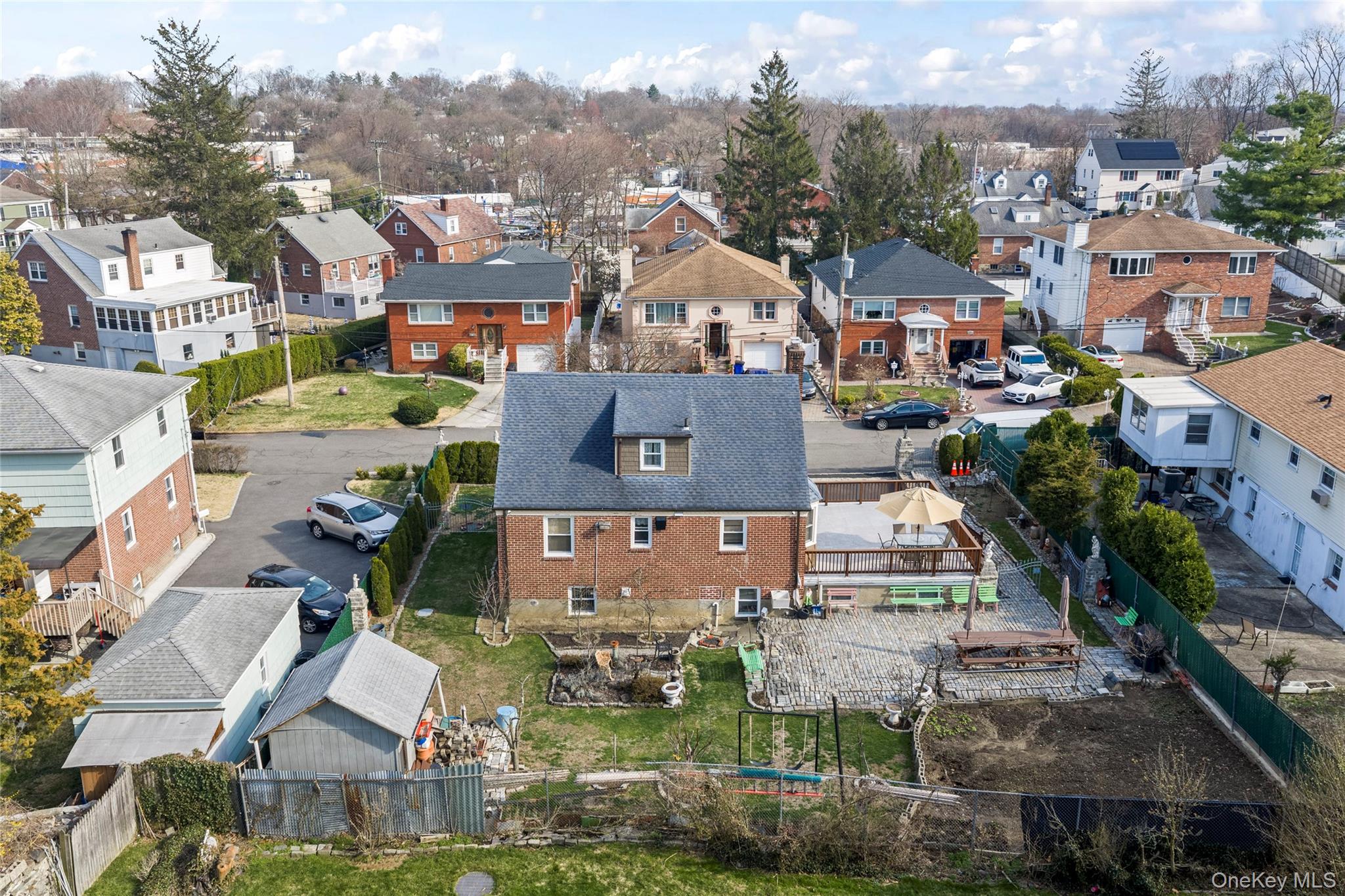 18 Butler Place Yonkers, NY 10710 - Photo 4 of 46 an aerial view of residential houses with outdoor space