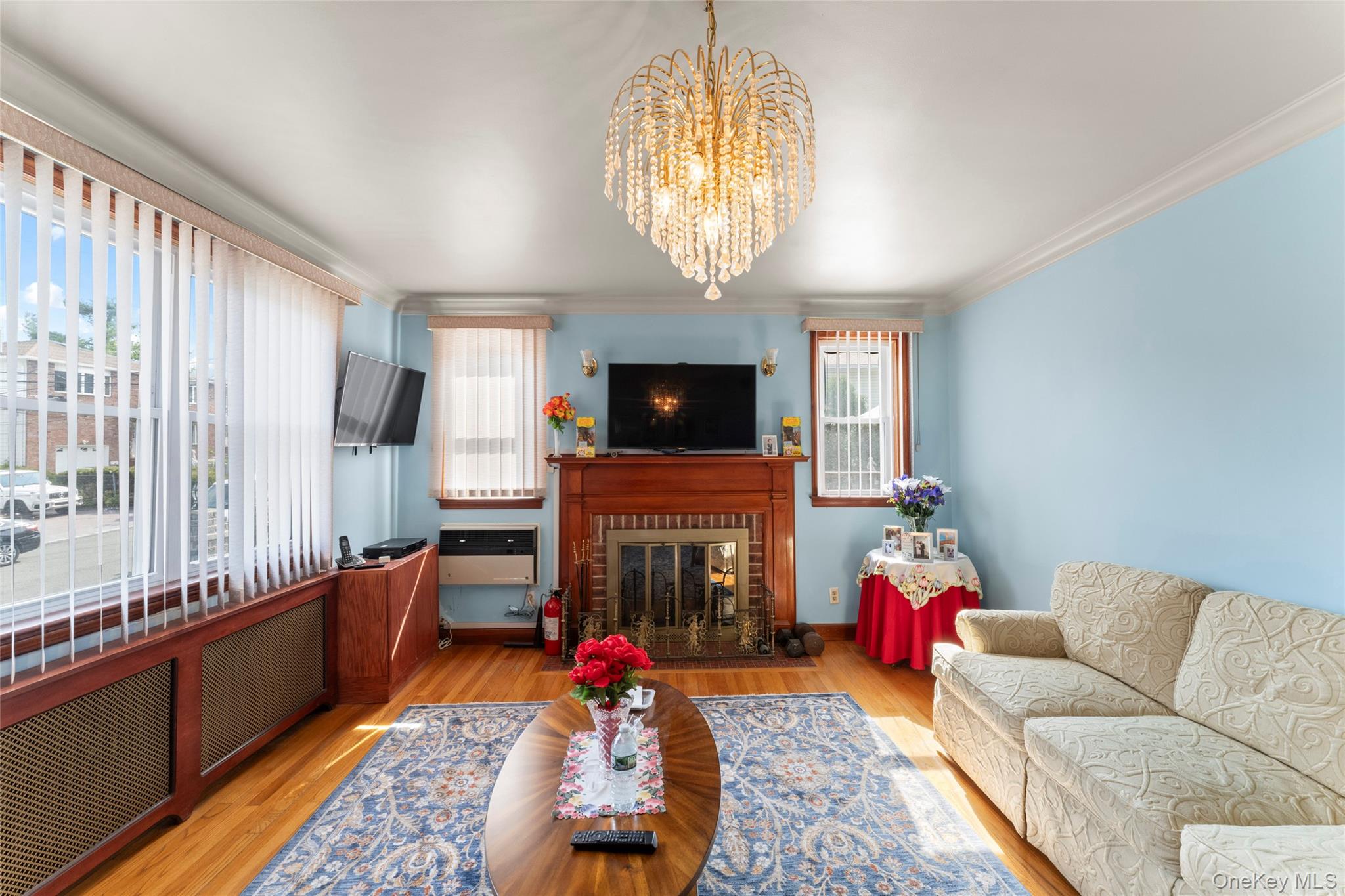 18 Butler Place Yonkers, NY 10710 - Photo 8 of 46 a living room with furniture and a flat screen tv