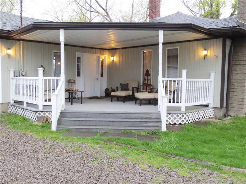 879 Freeport Road Freeport, PA 16229 - Photo 2 of 23 Patio/Deck. Covered front porch 17x16ft. trek decking.