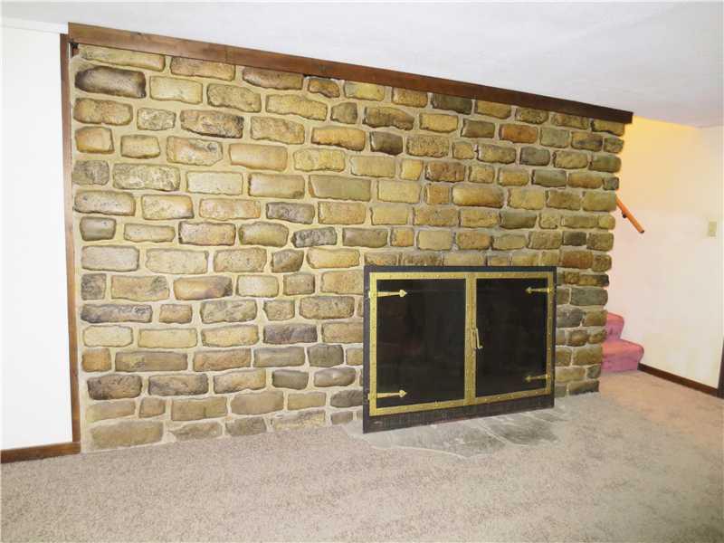 879 Freeport Road Freeport, PA 16229 - Photo 14 of 23 Family Room. Decorative fireplace could be easily uncapped.