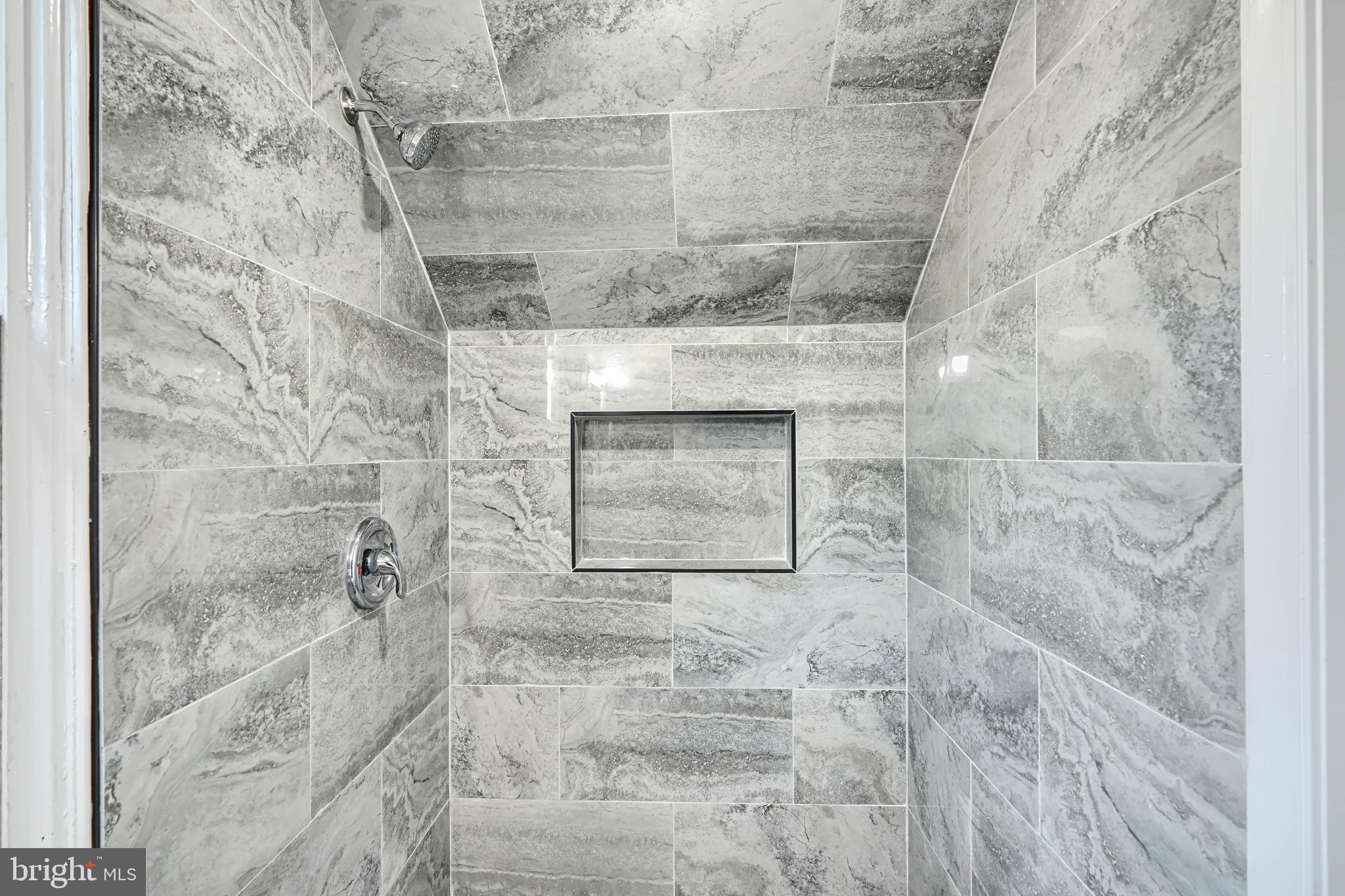 3515 Rhom Road Gwynn Oak, MD 21207 - Photo 24 of 36 a bathroom with a shower