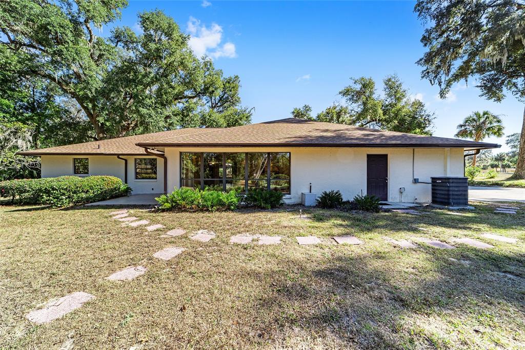 3590 Southwest 24th Avenue Road Ocala, FL 34471 - Photo 39 of 76 Expansive Landscaped Backyard