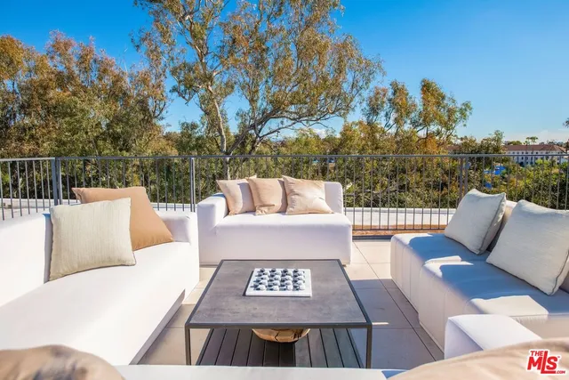 a view of a couches in the roof deck