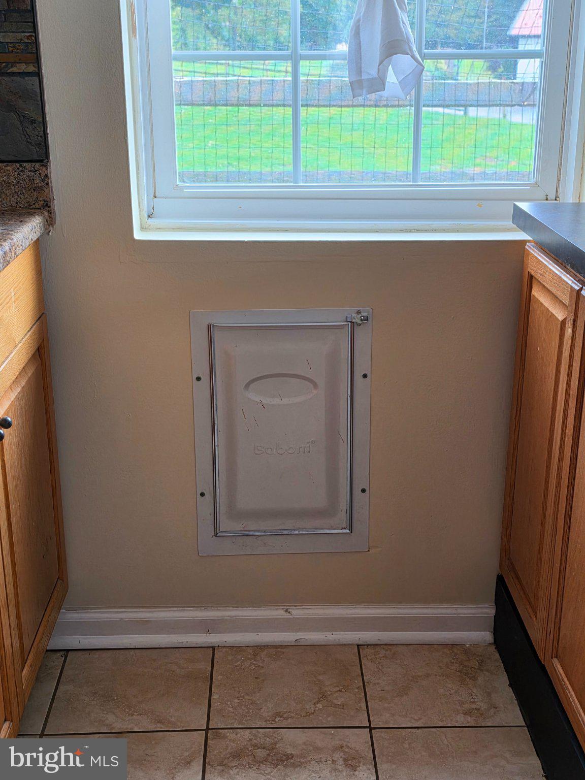 1116 Telegraph Road Coatesville, PA 19320 - Photo 10 of 11 Doggie door in kitchen.