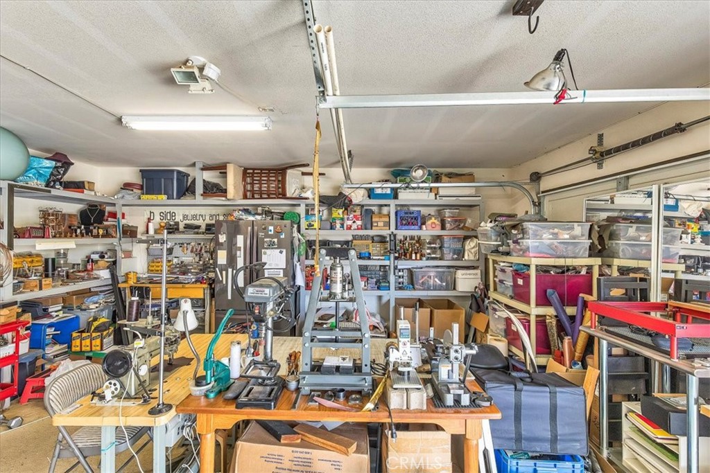 28984 Escalante Road Menifee, CA 92587 - Photo 33 of 40 Third car garage is a workshop
