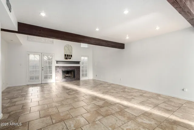 a view of kitchen with sink and microwave