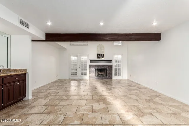 a bathroom with a sink vanity and a mirror