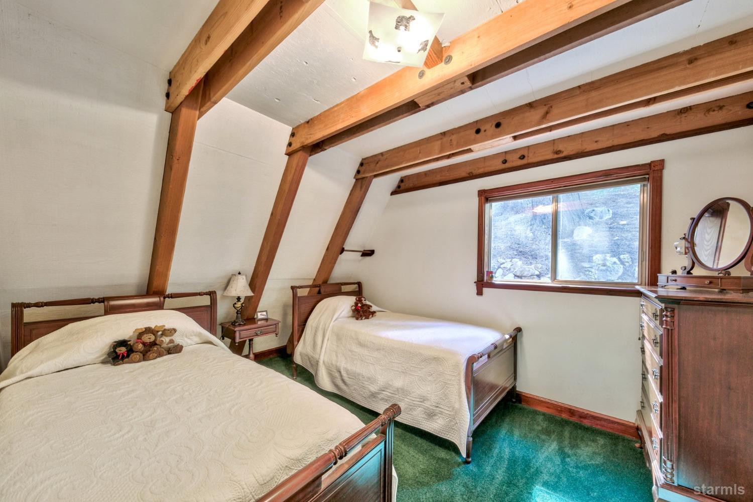 1085 Cooks Spur Road Twin Bridges, CA 95735 - Photo 18 of 30 a bedroom with bed and a window