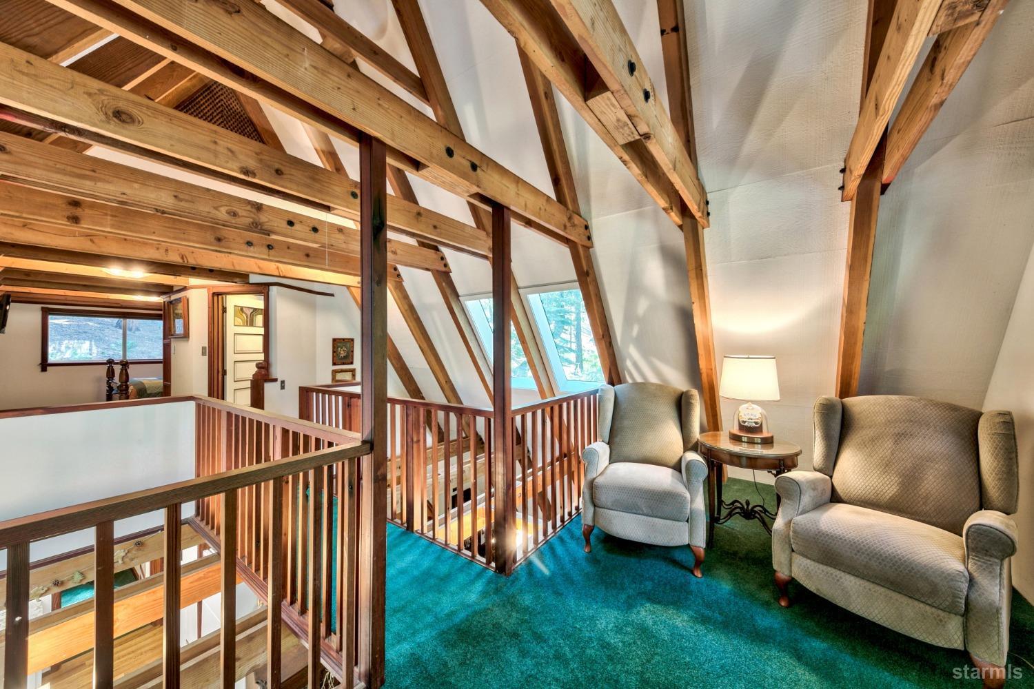 1085 Cooks Spur Road Twin Bridges, CA 95735 - Photo 23 of 30 a living room with furniture and a floor to ceiling window