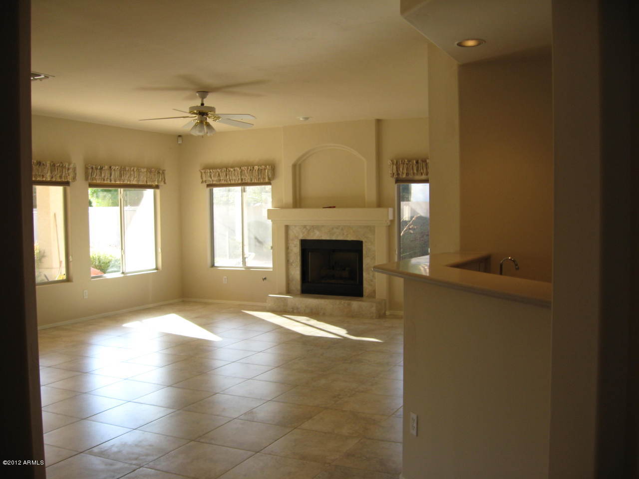 2187 East Victor Road Gilbert, AZ 85296 - Photo 12 of 32 Family Room with FP and Wet Bar