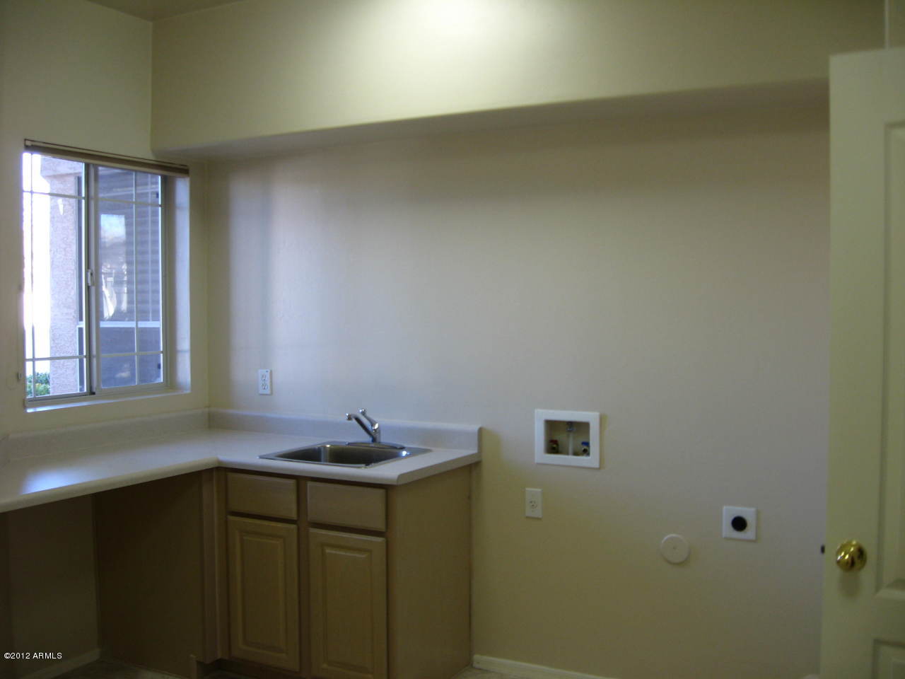 2187 East Victor Road Gilbert, AZ 85296 - Photo 16 of 32 Huge Laundry Room w/sink