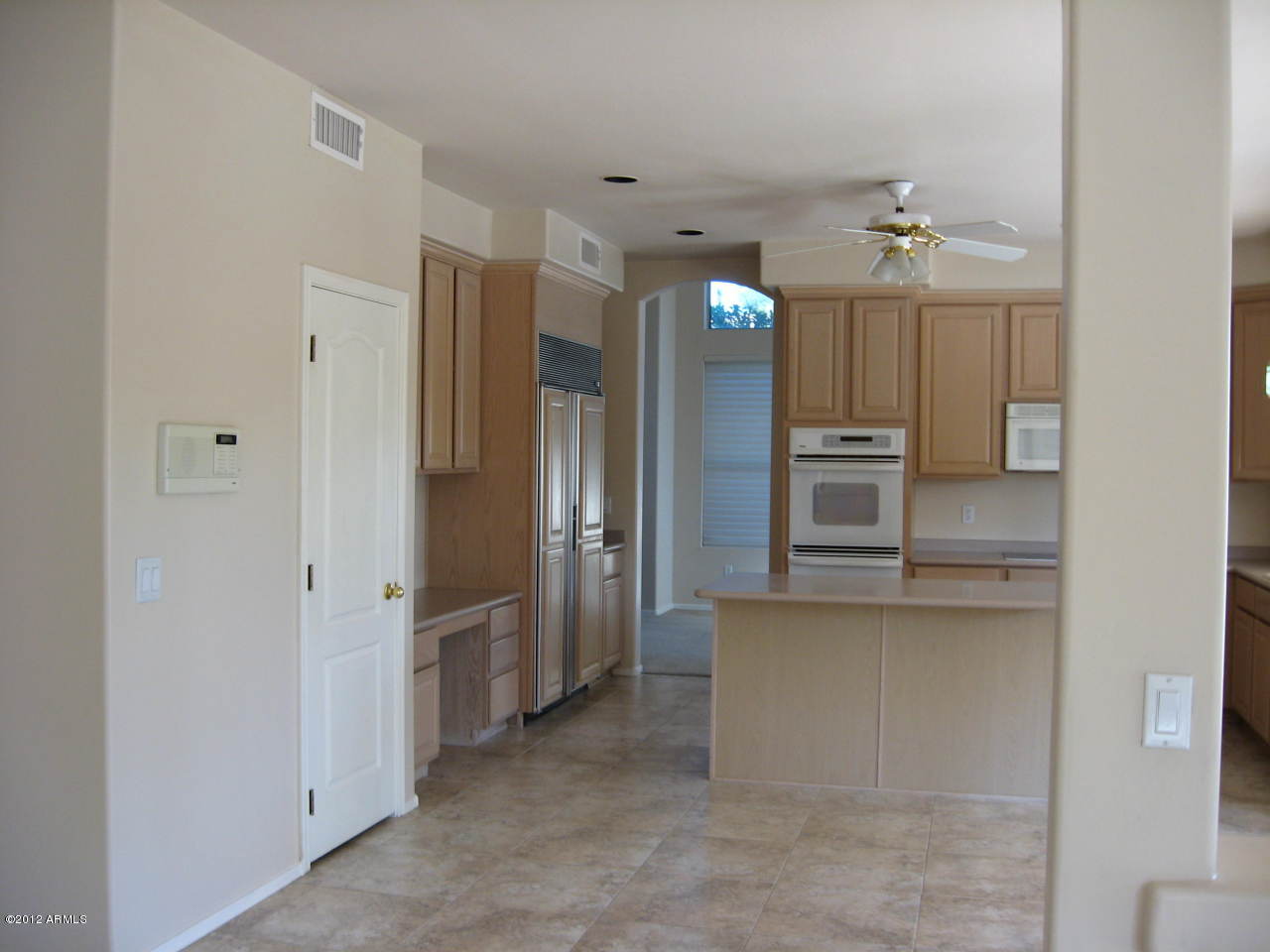 2187 East Victor Road Gilbert, AZ 85296 - Photo 19 of 32 Kitchen w/ custom Frig and Dbl Ovens