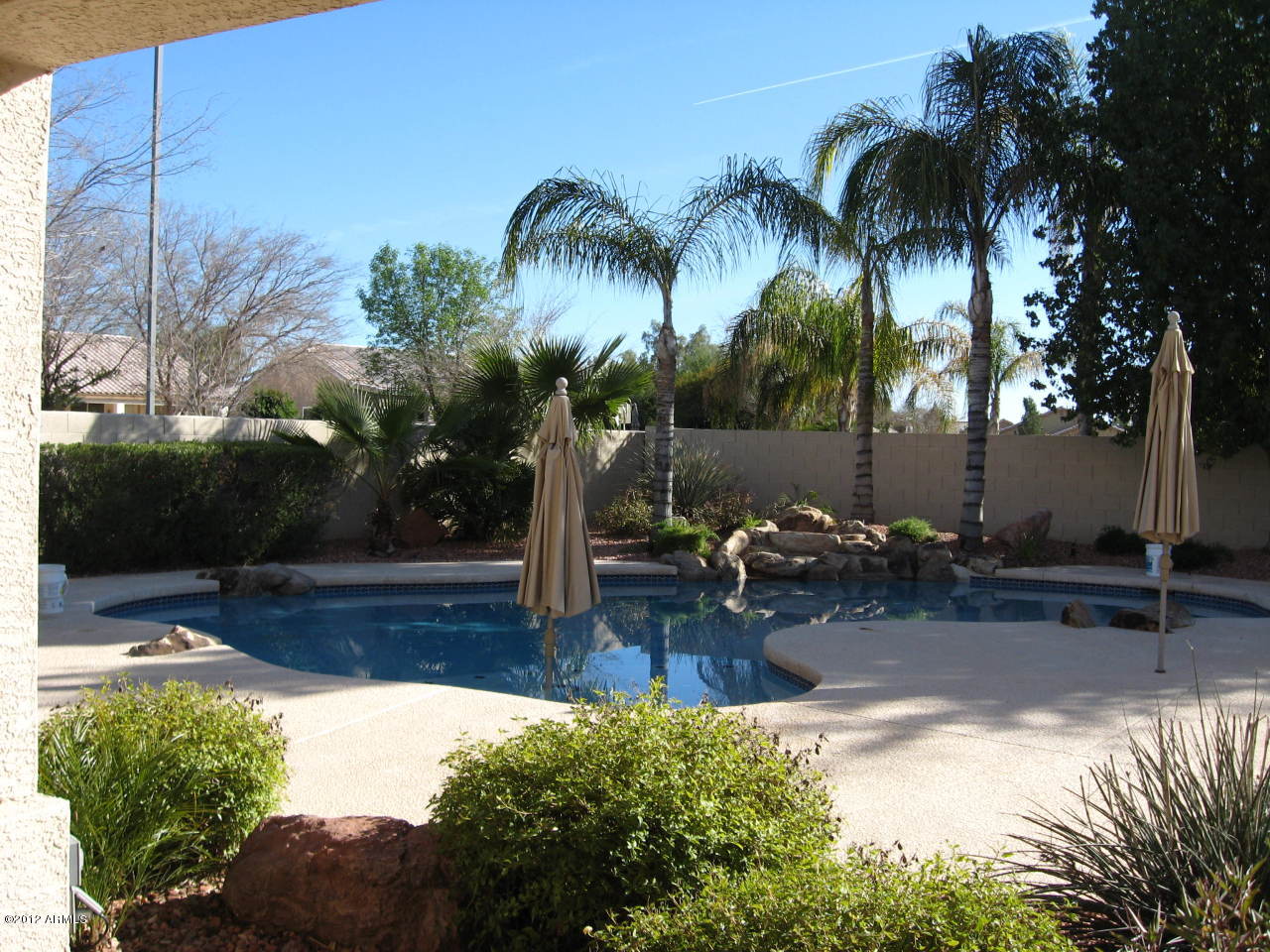 2187 East Victor Road Gilbert, AZ 85296 - Photo 25 of 32 Gorgeous Back Yard with Pool w/waterfall