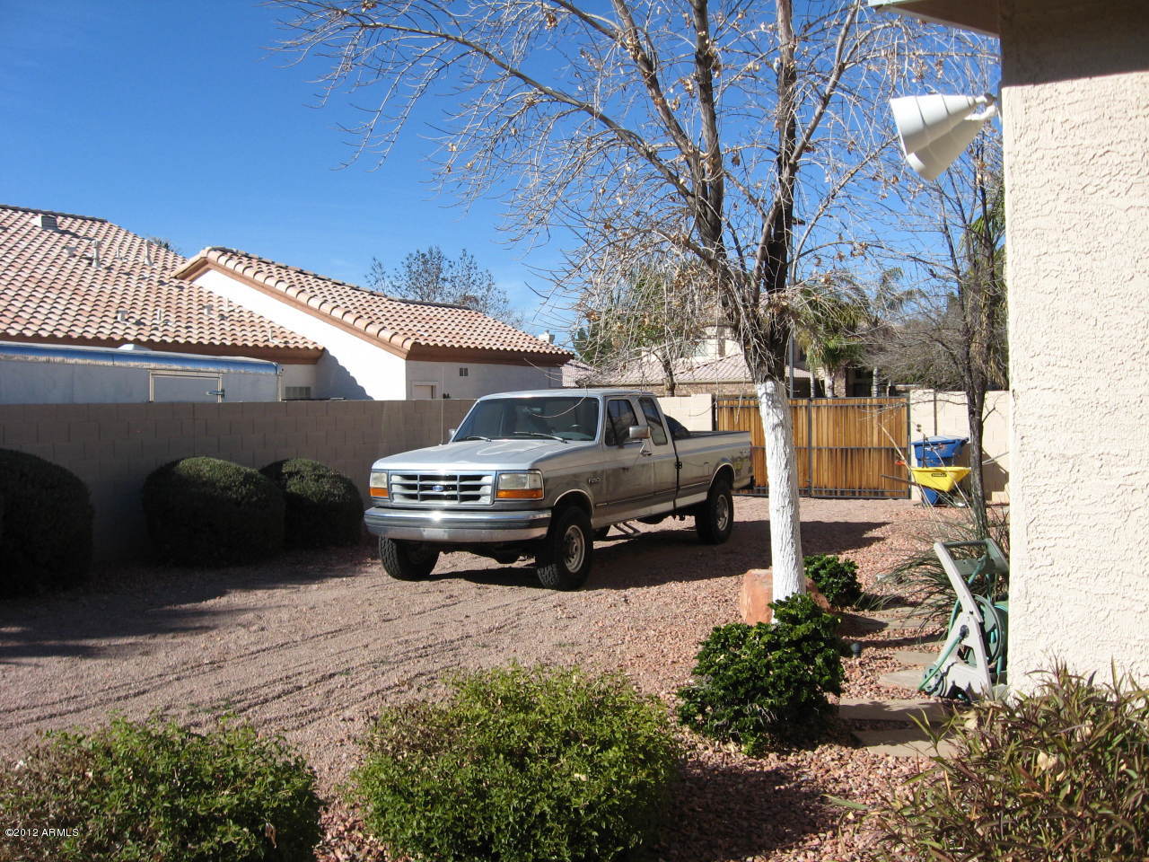 2187 East Victor Road Gilbert, AZ 85296 - Photo 29 of 32 Side yard w/RV Gate
