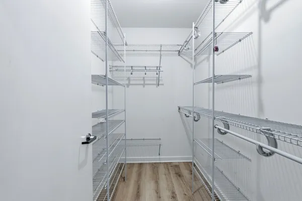 a view of a room with racks on the wall