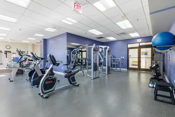 a view of a room with gym equipment