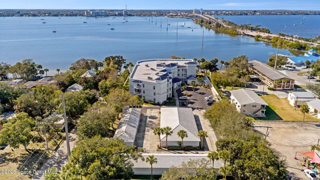 an aerial view of a house with a garden