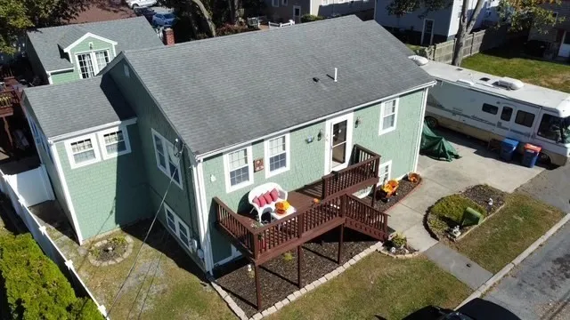 a aerial view of a house with a patio