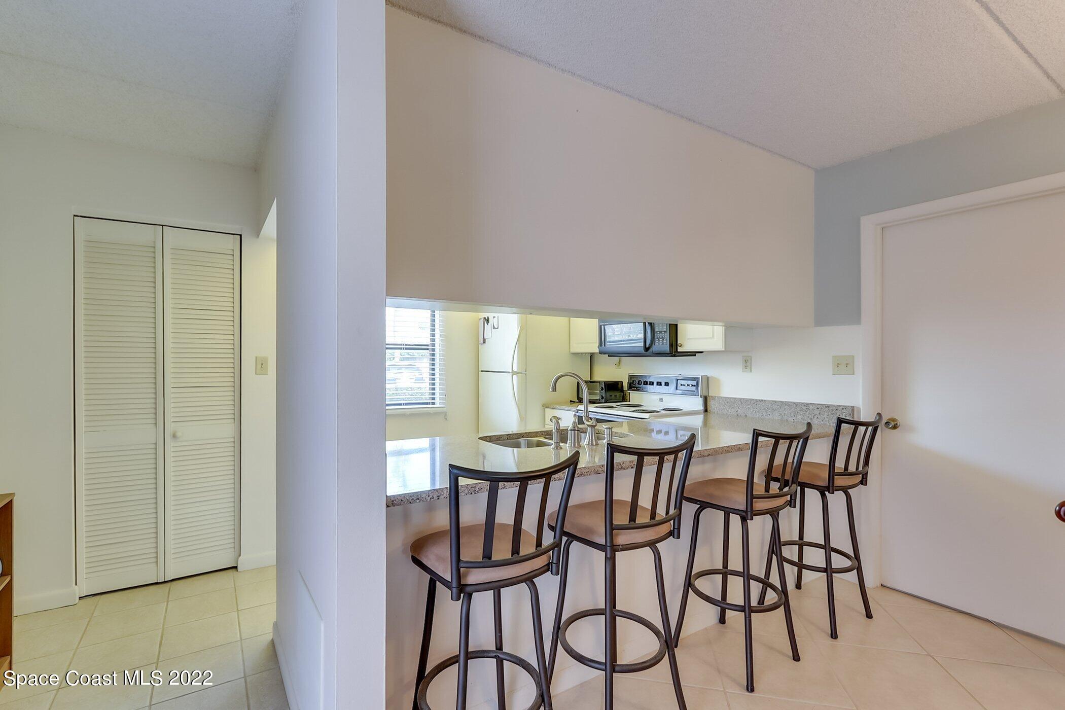 2727 North Wickham Road, Unit 10103 Melbourne, FL 32935 - Photo 14 of 46 Breakfast Bar