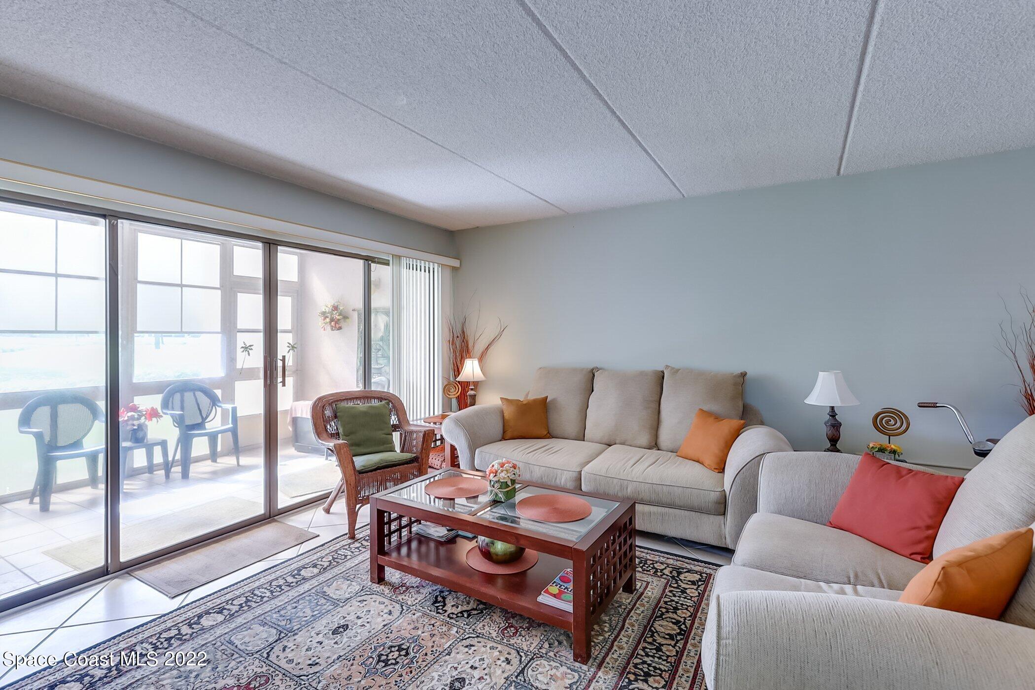 2727 North Wickham Road, Unit 10103 Melbourne, FL 32935 - Photo 17 of 46 Sliders to Porch