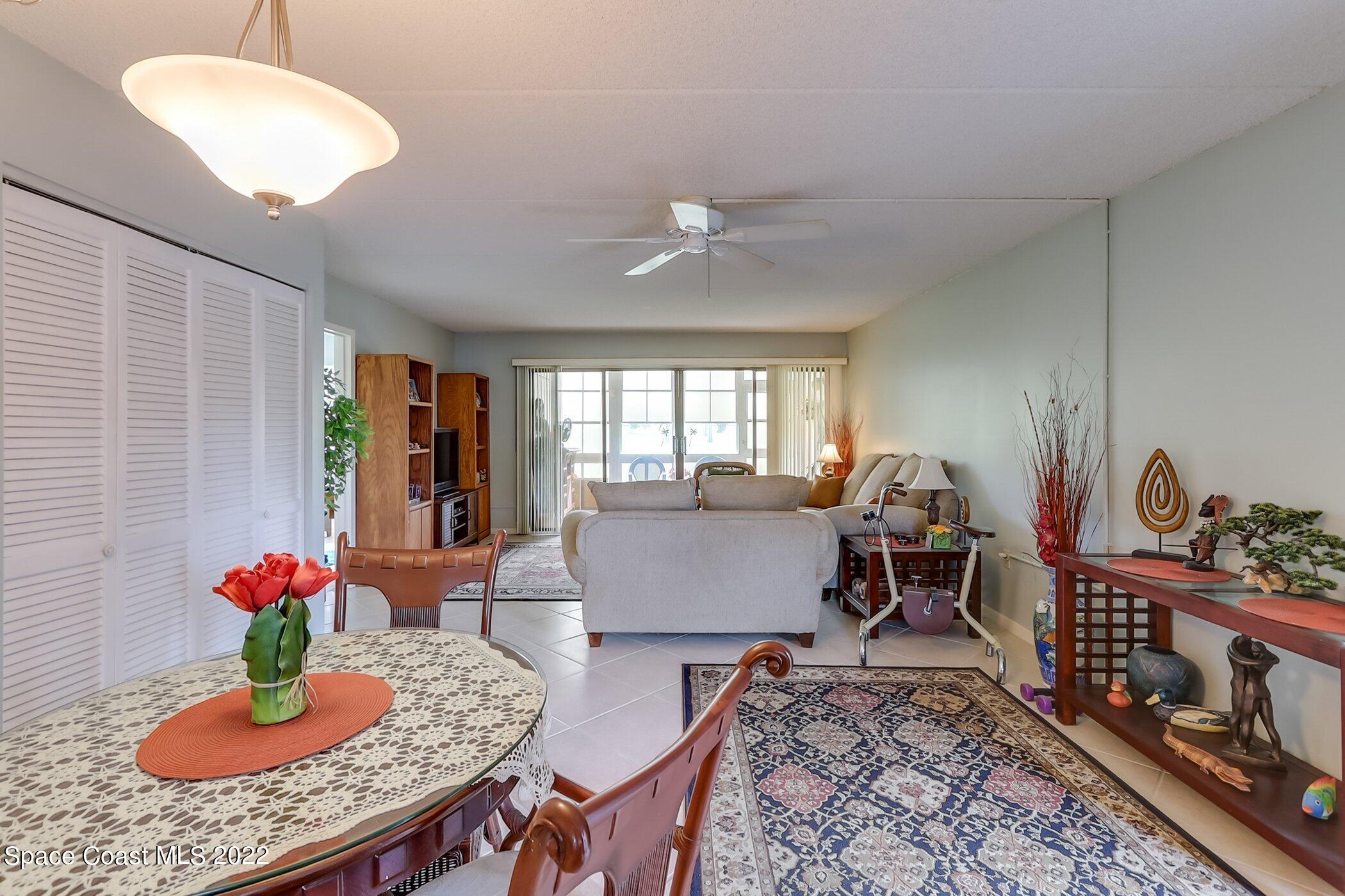2727 North Wickham Road, Unit 10103 Melbourne, FL 32935 - Photo 9 of 46 Dining/Living