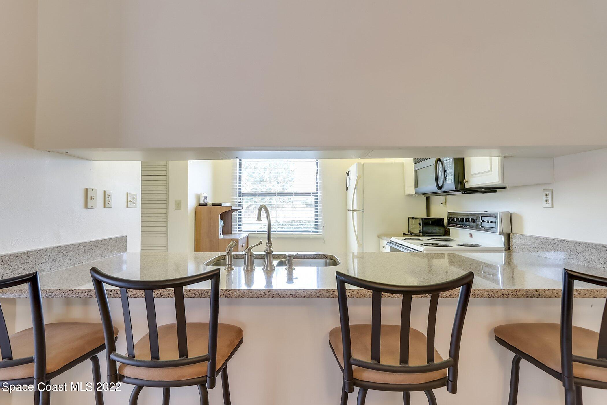 2727 North Wickham Road, Unit 10103 Melbourne, FL 32935 - Photo 10 of 46 Breakfast Bar