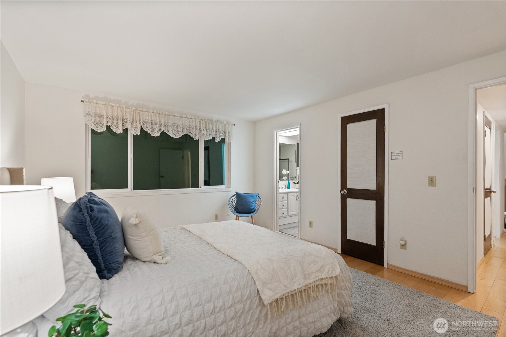 15618 Southeast 174th Street Renton, WA 98058 - Photo 12 of 28 a bedroom with a bed and a window