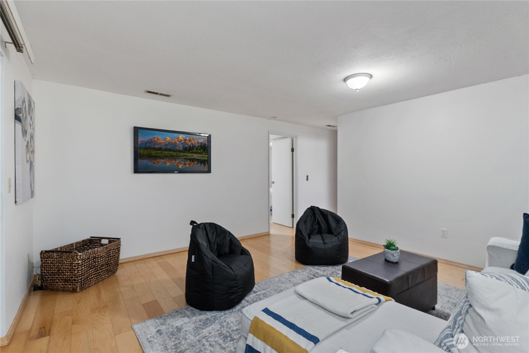 15618 Southeast 174th Street Renton, WA 98058 - Photo 19 of 28 a living room with furniture and a window
