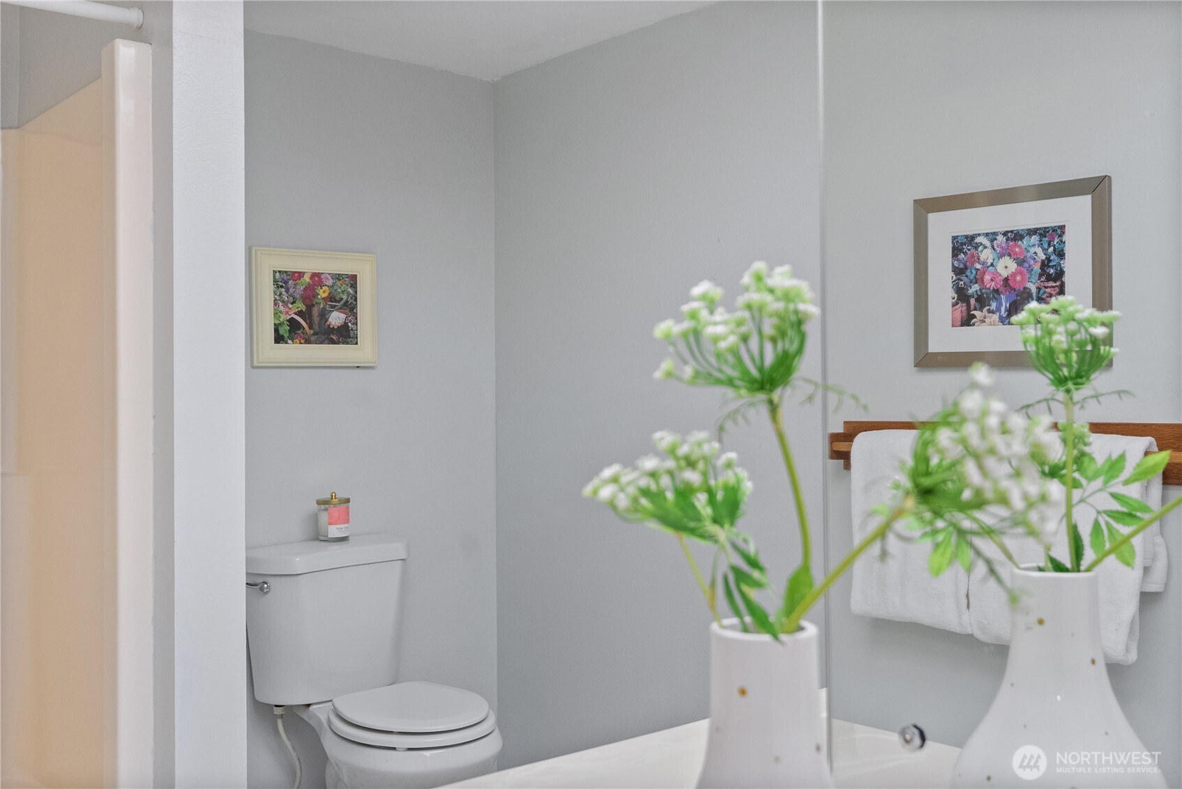 15618 Southeast 174th Street Renton, WA 98058 - Photo 21 of 28 a view of a hallway with painting on the wall