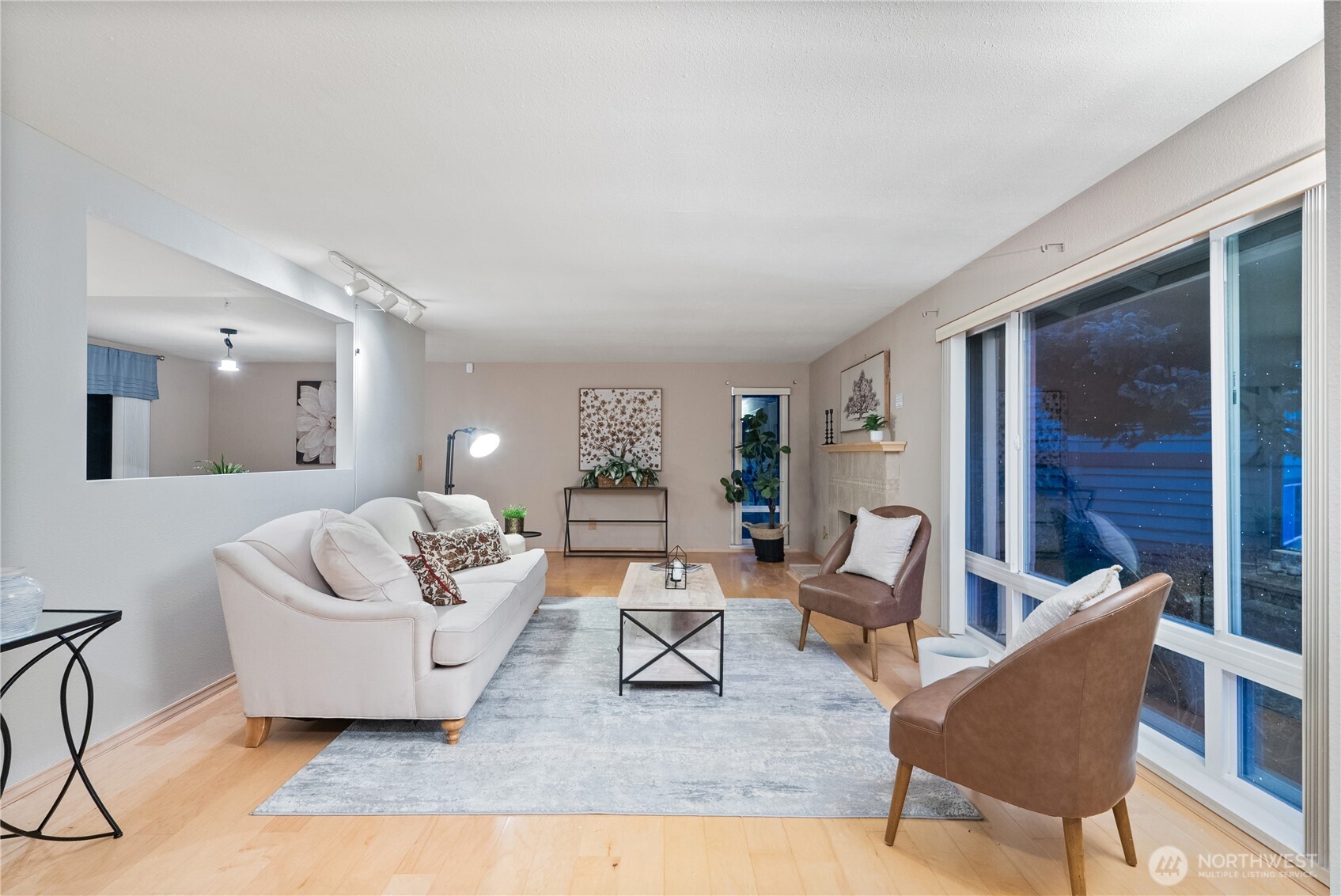 15618 Southeast 174th Street Renton, WA 98058 - Photo 3 of 28 a living room with furniture and a potted plant