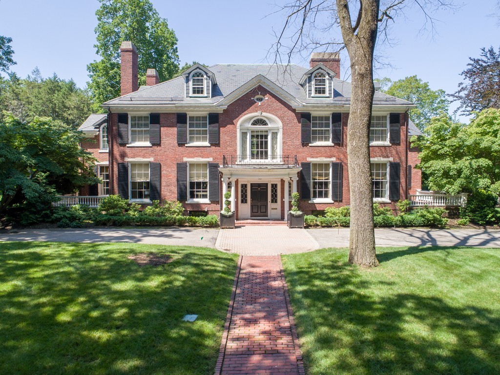 65 Lenox Street Newton, MA 02465 - Photo 1 of 16 a front view of a house with a yard