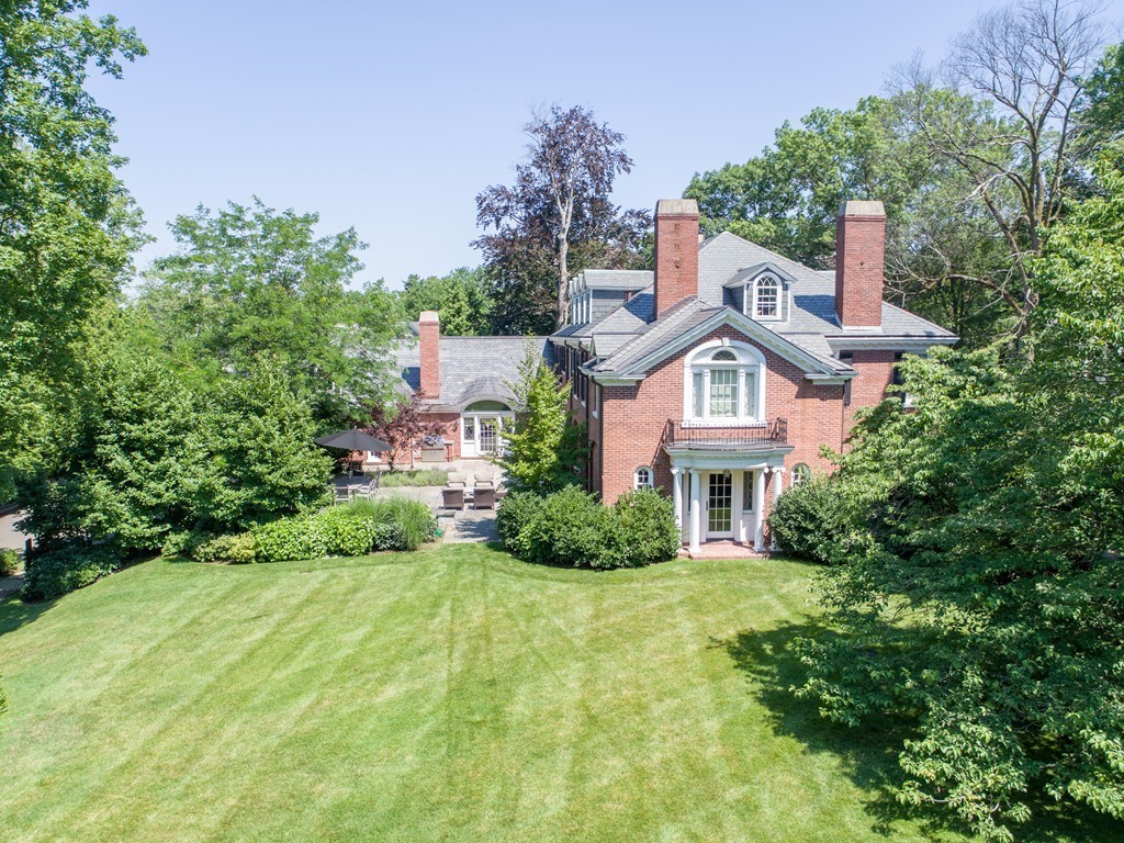 65 Lenox Street Newton, MA 02465 - Photo 11 of 16 a aerial view of a house with a yard and potted plants