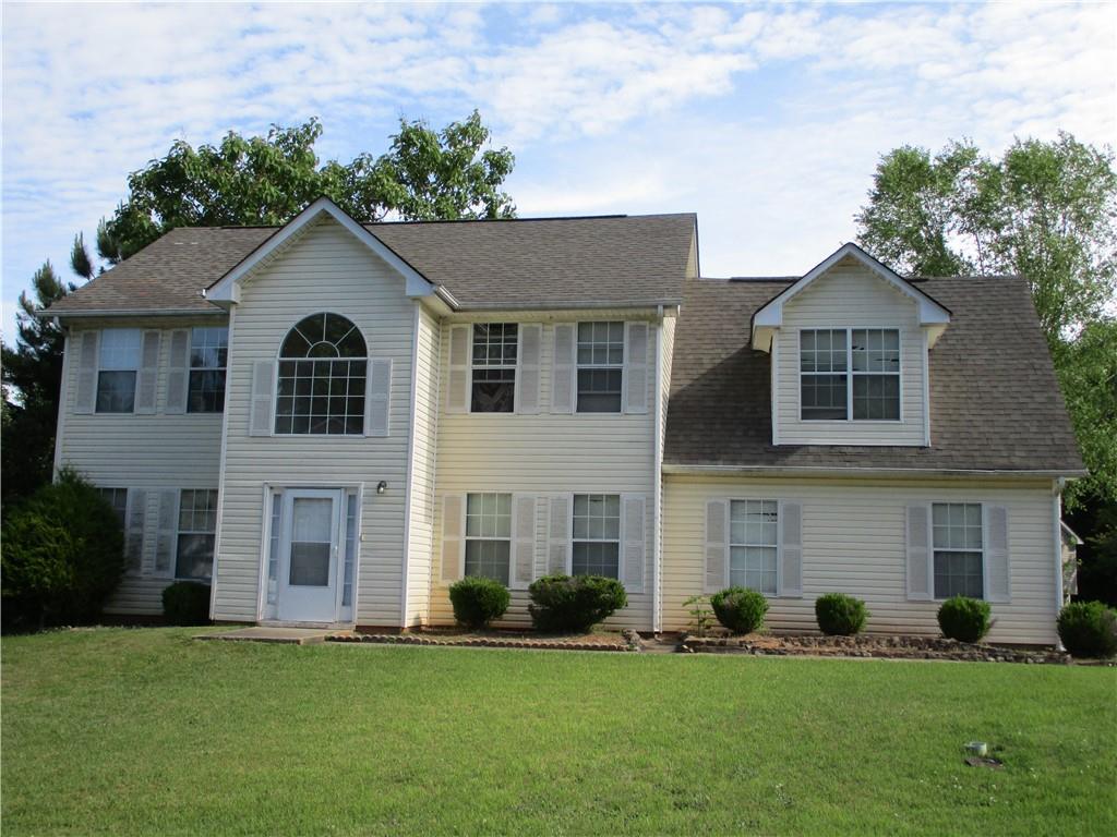 4792 Creekside Place Decatur, GA 30035 - Photo 1 of 1 a front view of a house with a yard