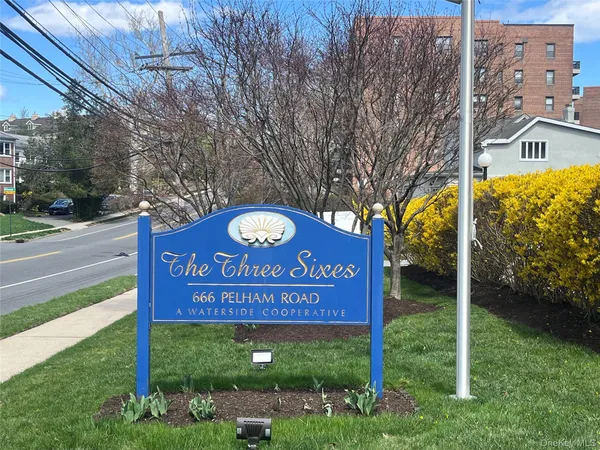 a sign on the side of the road