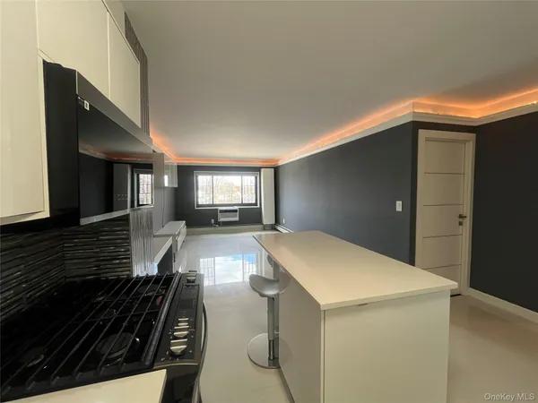 a view of kitchen and dining room with wooden floor