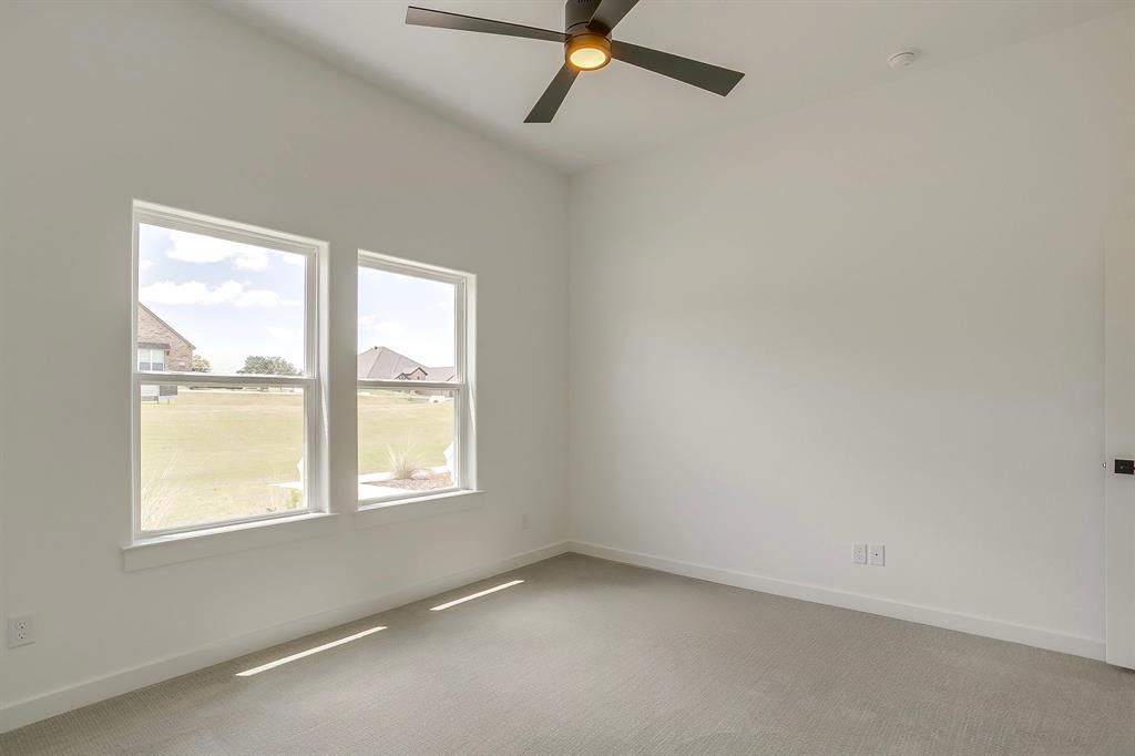 9012 Valley Oak Court Springtown, TX 76082 - Photo 22 of 40 an empty room with a window