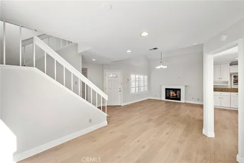 a view of a hallway with staircase