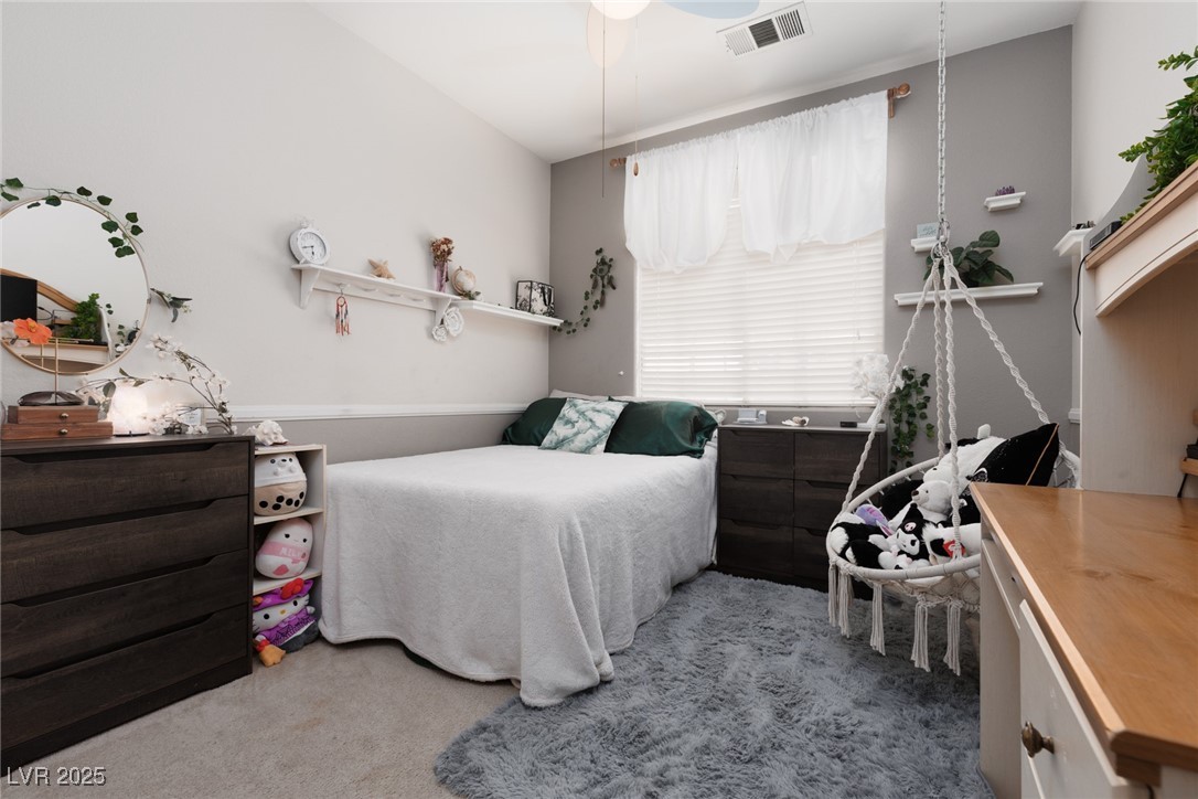 99 Milicity Road Henderson, NV 89012 - Photo 25 of 51 Bedroom featuring light carpet