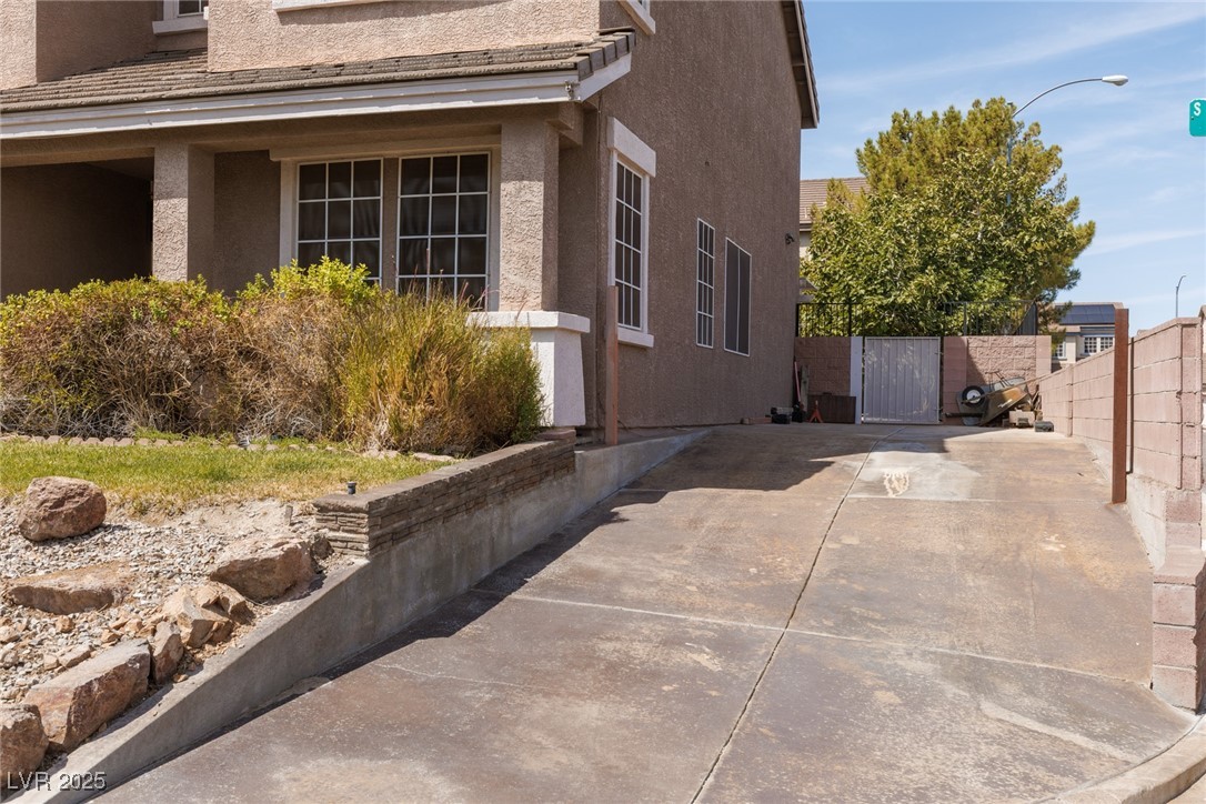 View of side of property with stucco siding
