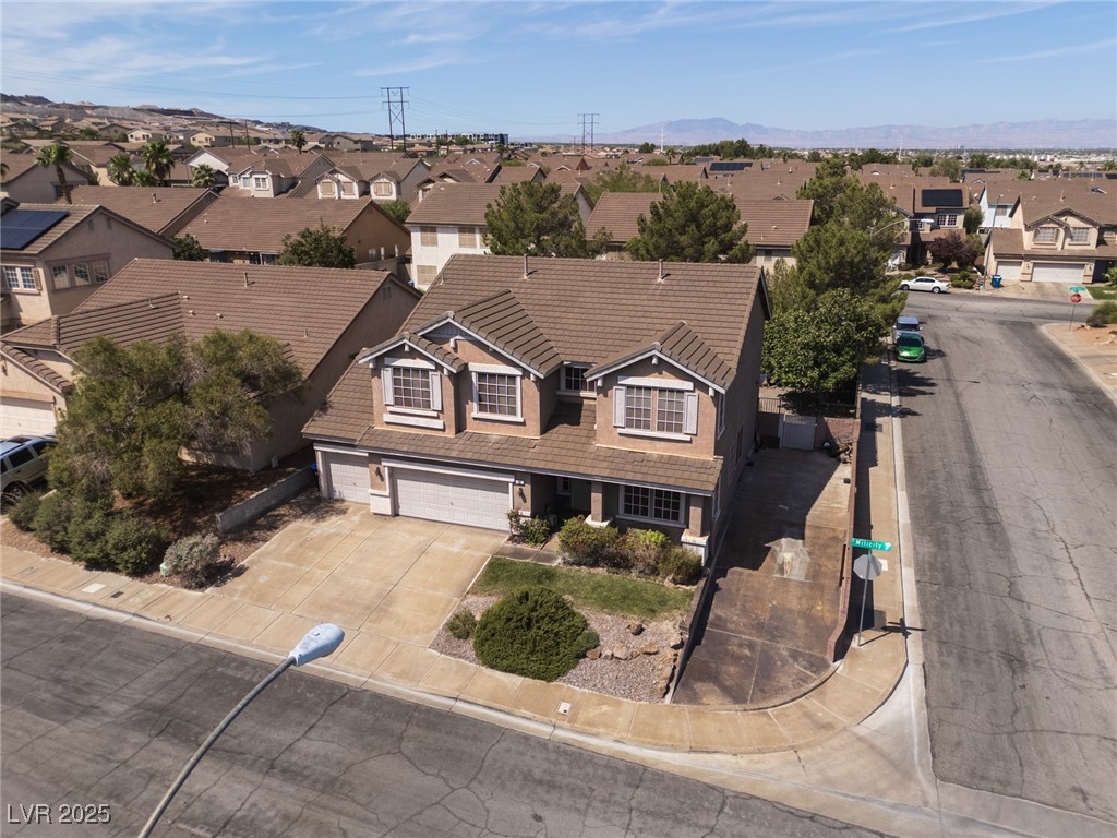 99 Milicity Road Henderson, NV 89012 - Photo 43 of 51 Aerial perspective of suburban area