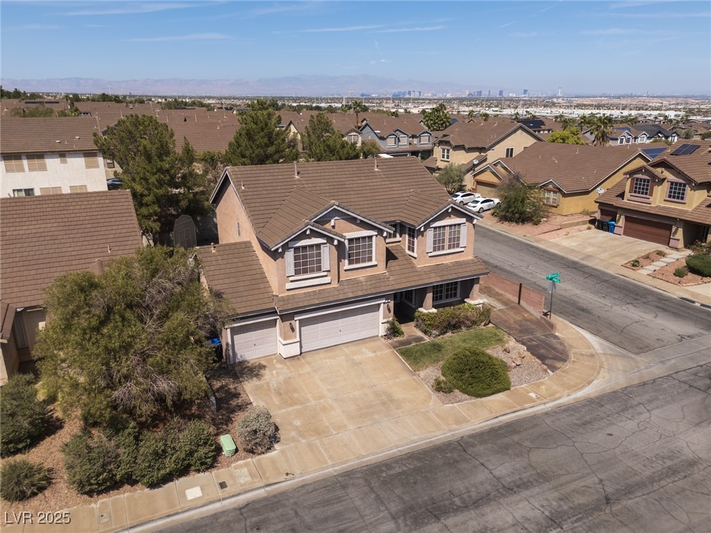 99 Milicity Road Henderson, NV 89012 - Photo 44 of 51 Aerial perspective of suburban area