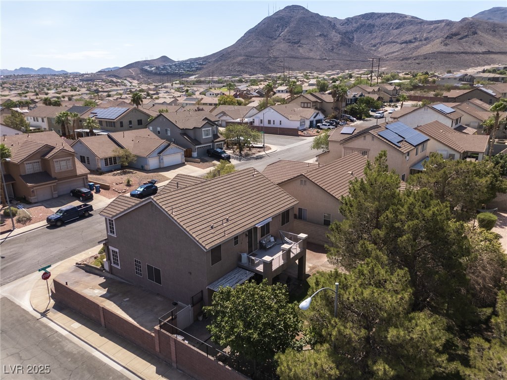99 Milicity Road Henderson, NV 89012 - Photo 46 of 51 Aerial view of residential area with a mountainous background