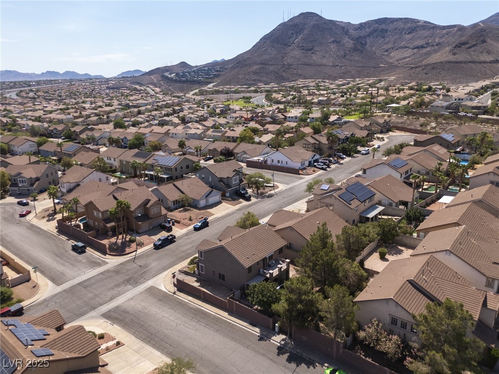 99 Milicity Road Henderson, NV 89012 - Photo 47 of 51 Drone / aerial view of a mountain backdrop