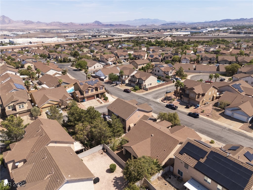 99 Milicity Road Henderson, NV 89012 - Photo 48 of 51 Aerial view of residential area with mountains